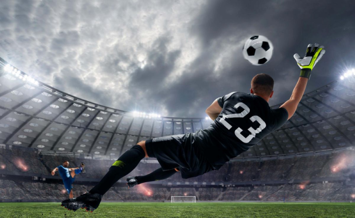 Portero parando una pelota en el mundial